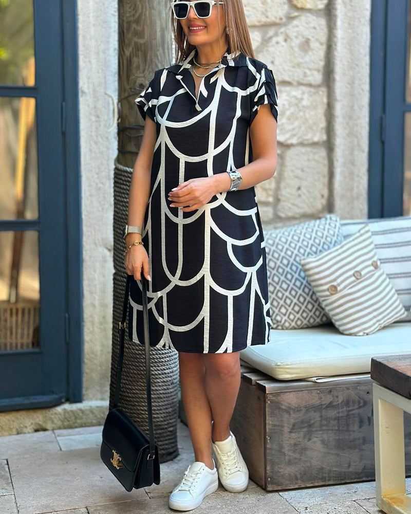 Nahia – Robe midi élégante à manches courtes et rabat